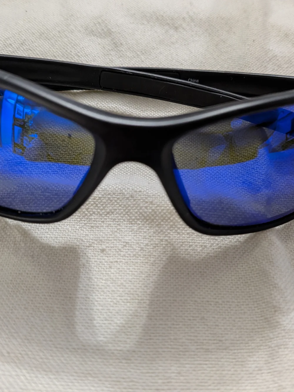 Ocean Waves Black Wrap Sunglasses Blue Mirrored Lenses